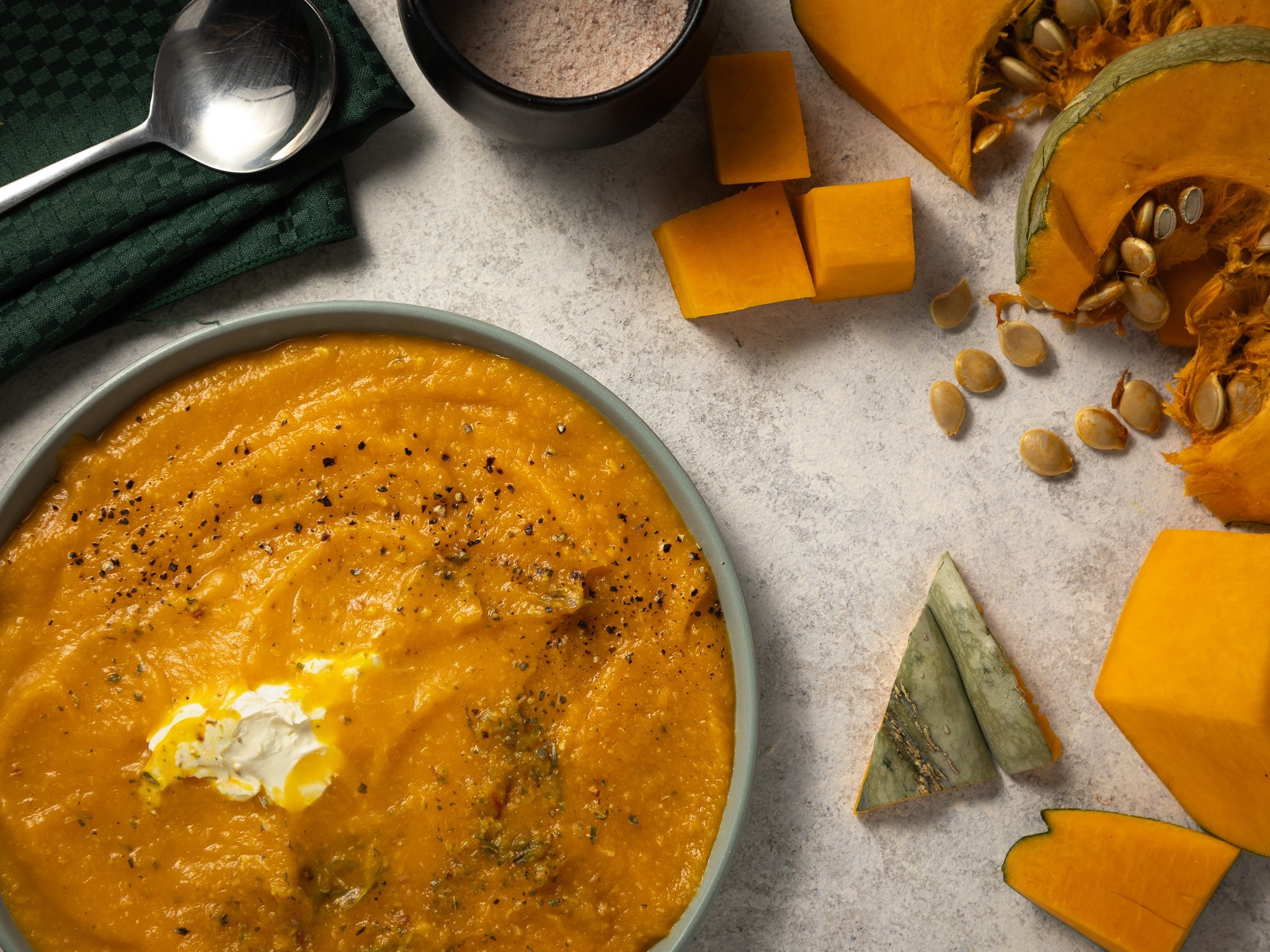 Country styled pumpkin soup set as flatlay for food photography